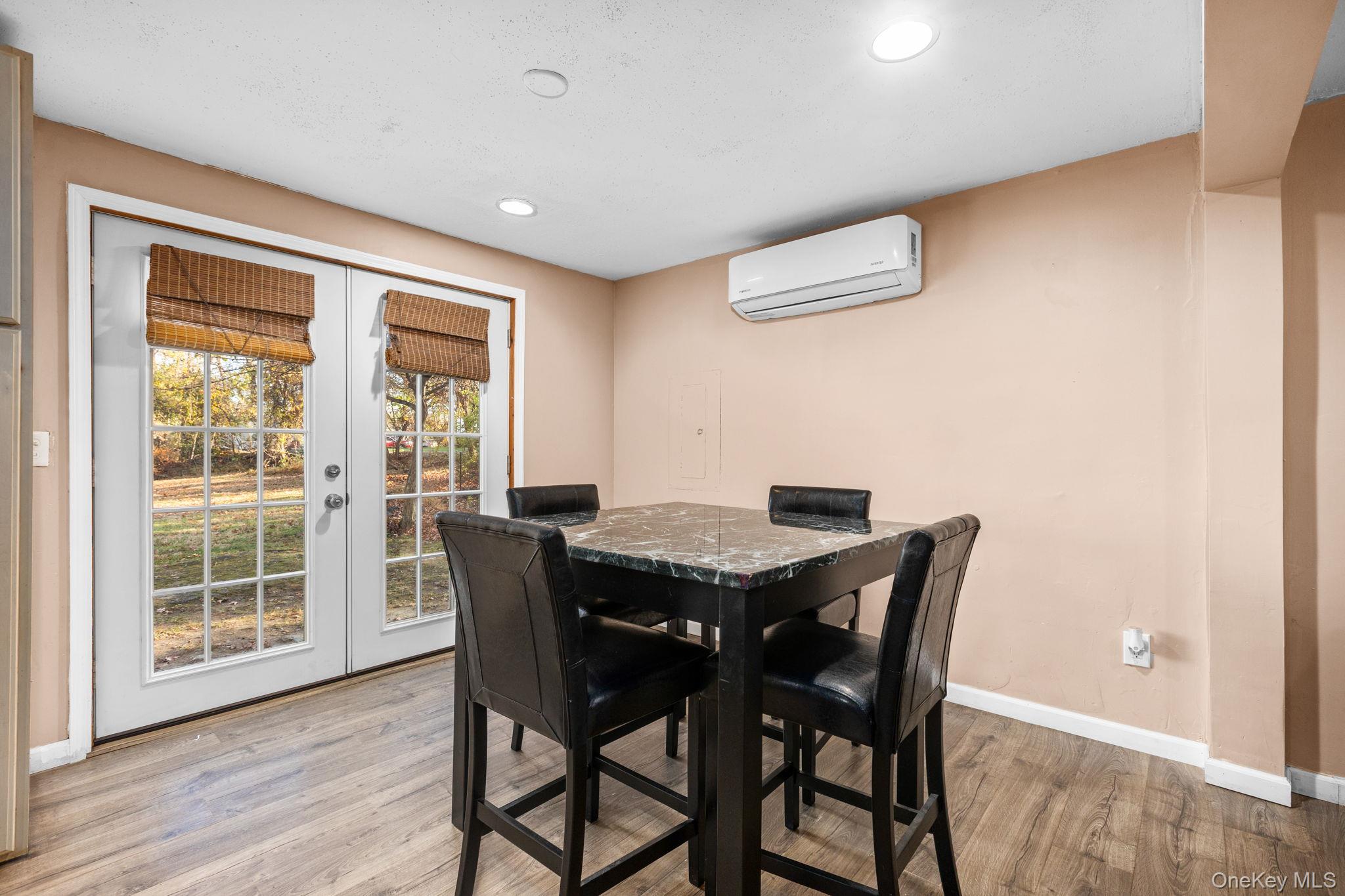104 Riley Road New Windsor, NY 12553 - Photo 10 of 35 a view of a dining room with furniture and wooden floor