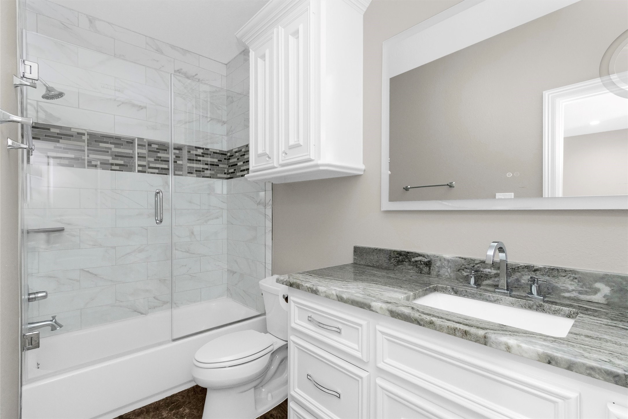 10887 Decatur Street Willis, TX 77318 - Photo 40 of 50 All guest ensuites feature frameless glass, illuminated mirrors and high-level granite.