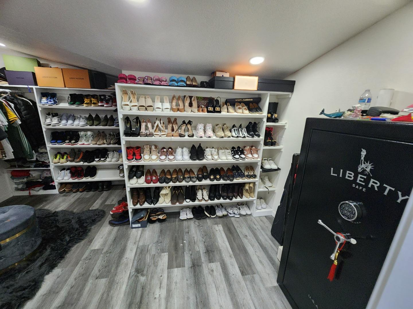 601 Weyer Road Modesto, CA 95357 - Photo 16 of 27 a view of walk in closet with clothes and shoes