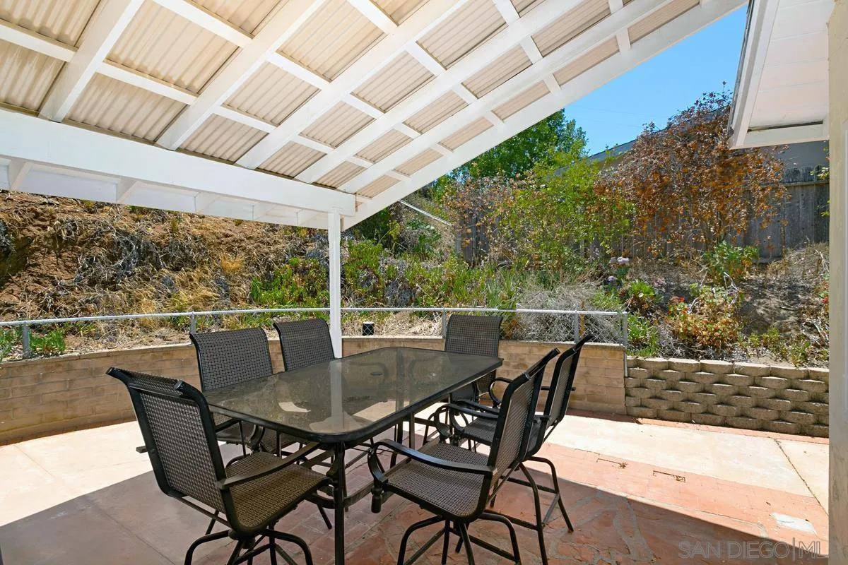 11615 Westridge Place Lakeside, CA 92040 - Photo 20 of 29 a view of an outdoor dining space with furniture and wooden floor