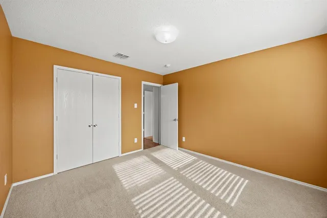 a view of a big room with wooden floor