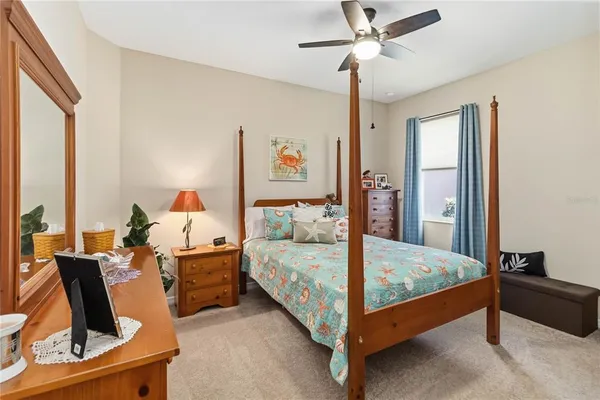 a bed room with a bed and a window