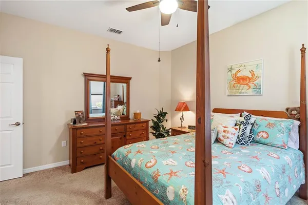 a bedroom with a bed and furniture