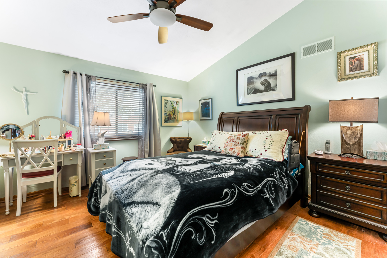 6646 North Point Road Rockford, IL 61108 - Photo 13 of 33 a bedroom with a bed and a chandelier