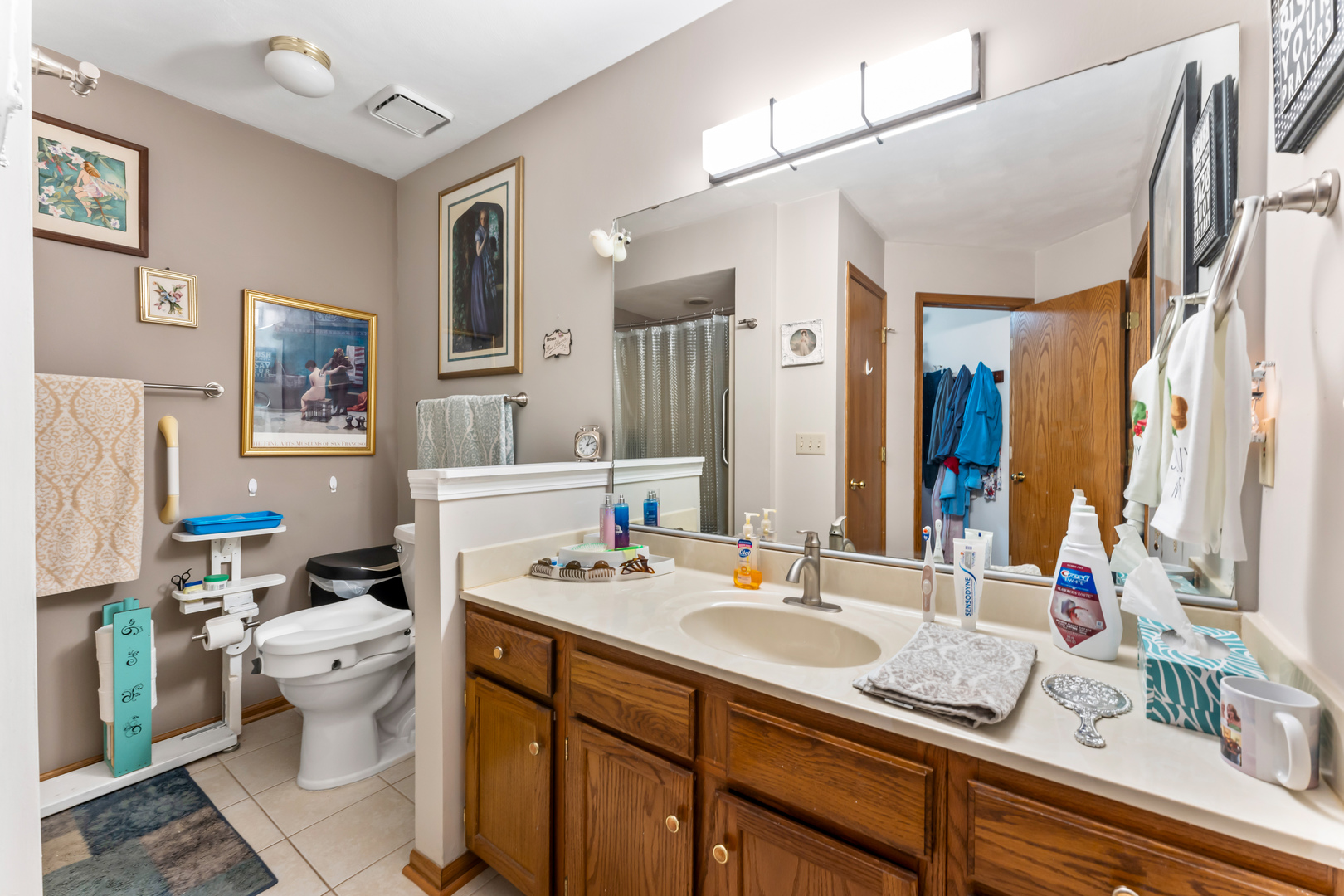 6646 North Point Road Rockford, IL 61108 - Photo 15 of 33 a bathroom with a granite countertop sink mirror and toilet