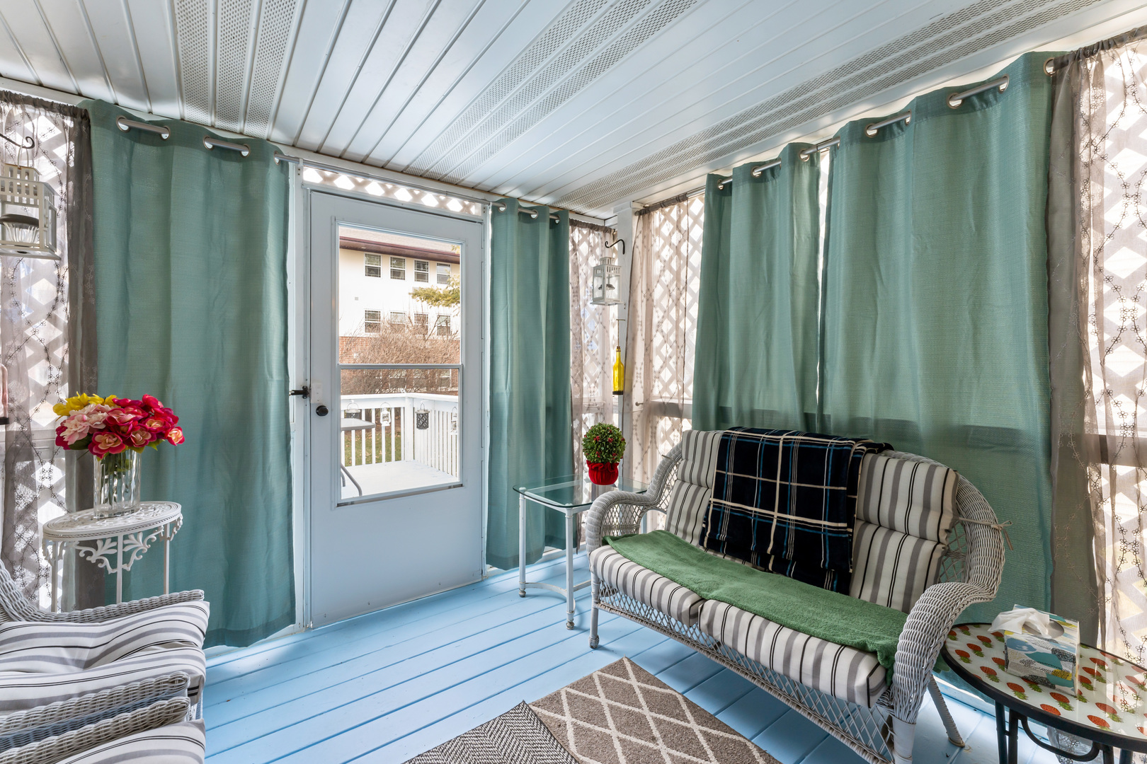 6646 North Point Road Rockford, IL 61108 - Photo 17 of 33 a balcony with furniture and flowers