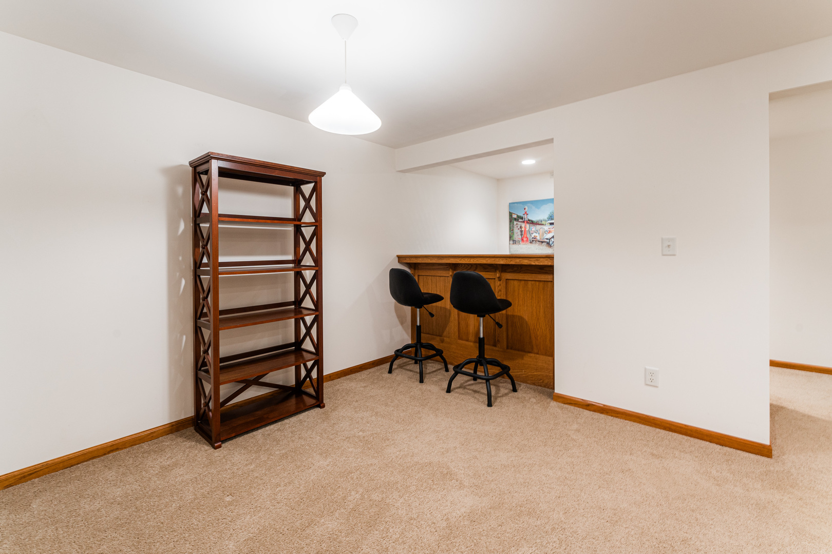 6646 North Point Road Rockford, IL 61108 - Photo 23 of 33 a view of workspace with wooden floor lounge chair and windows