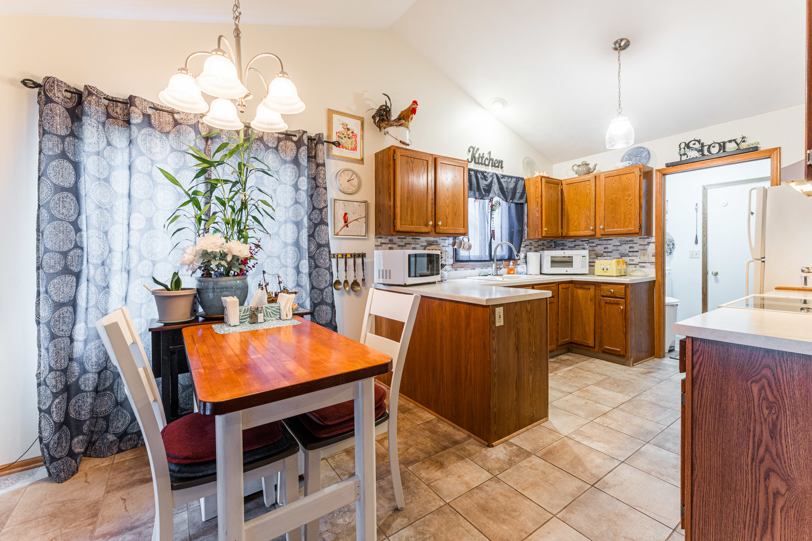 6646 North Point Road Rockford, IL 61108 - Photo 7 of 33 a kitchen with stainless steel appliances granite countertop a stove top oven a sink dishwasher and a wooden cabinets