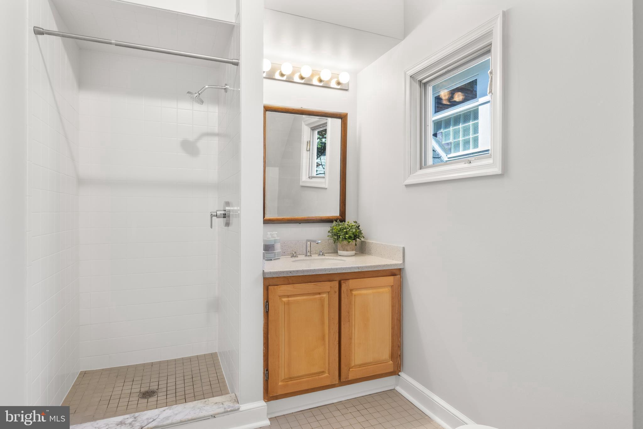 5624 Madison Street Bethesda, MD 20817 - Photo 15 of 28 a view of an entryway with wooden floor