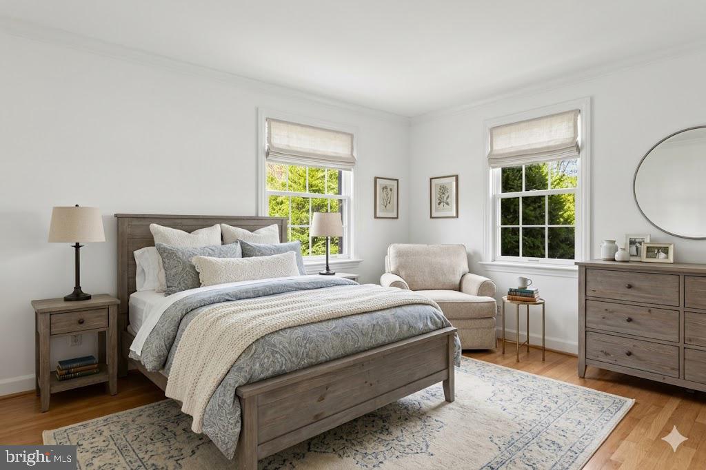 5624 Madison Street Bethesda, MD 20817 - Photo 20 of 28 a bedroom with a bed and a window