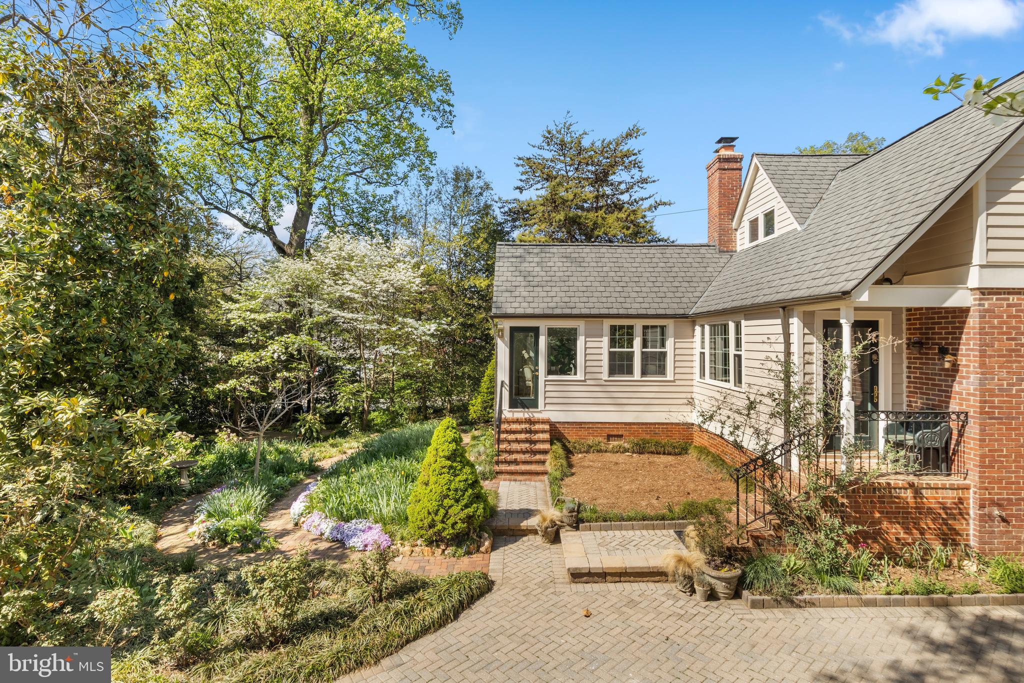 5624 Madison Street Bethesda, MD 20817 - Photo 3 of 28 front view of house with a yard