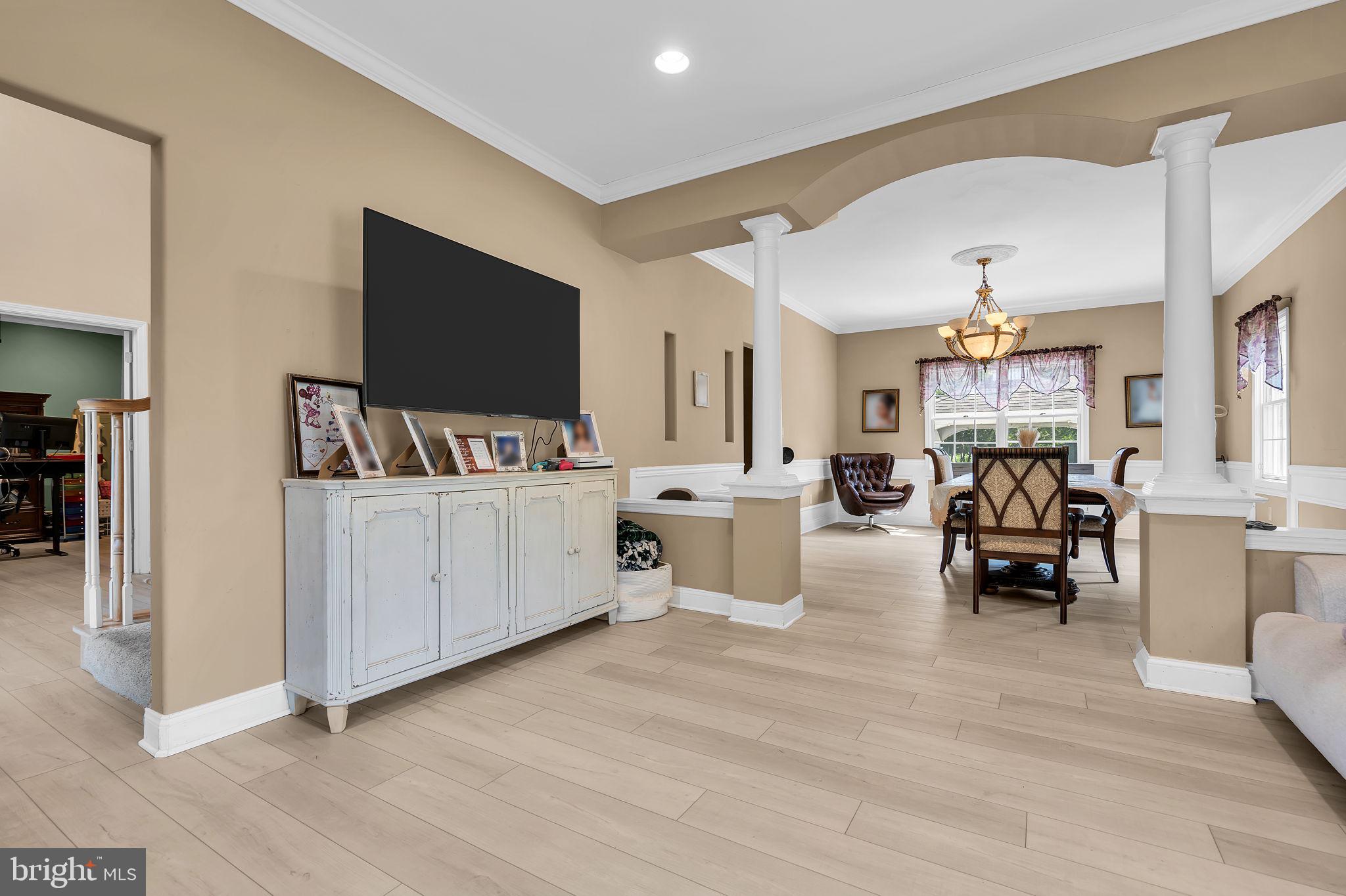 73 Paulson Road Wrightstown, NJ 08562 - Photo 11 of 34 Inviting open space with warm tones.