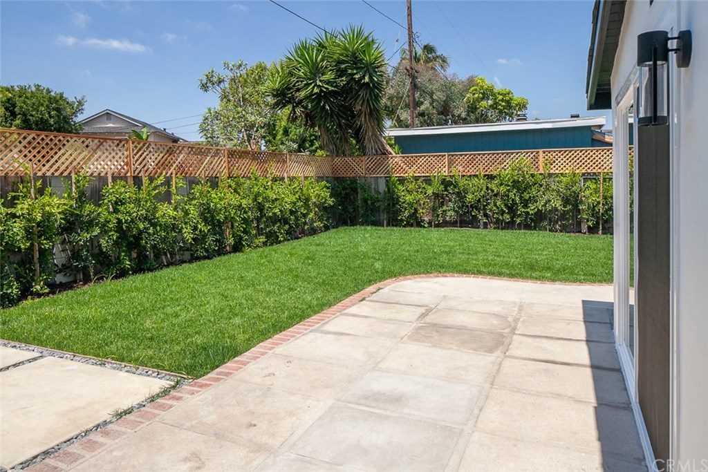 297 Rose Lane Costa Mesa, CA 92627 - Photo 16 of 17 a view of porch with a yard