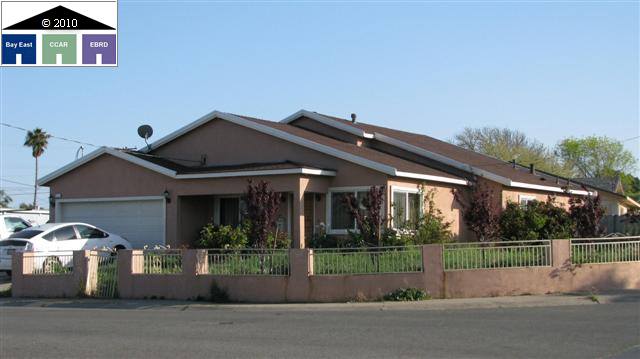323 Shore Road Bay Point, CA 94565 - Photo 1 of 1 a front view of a house with garden