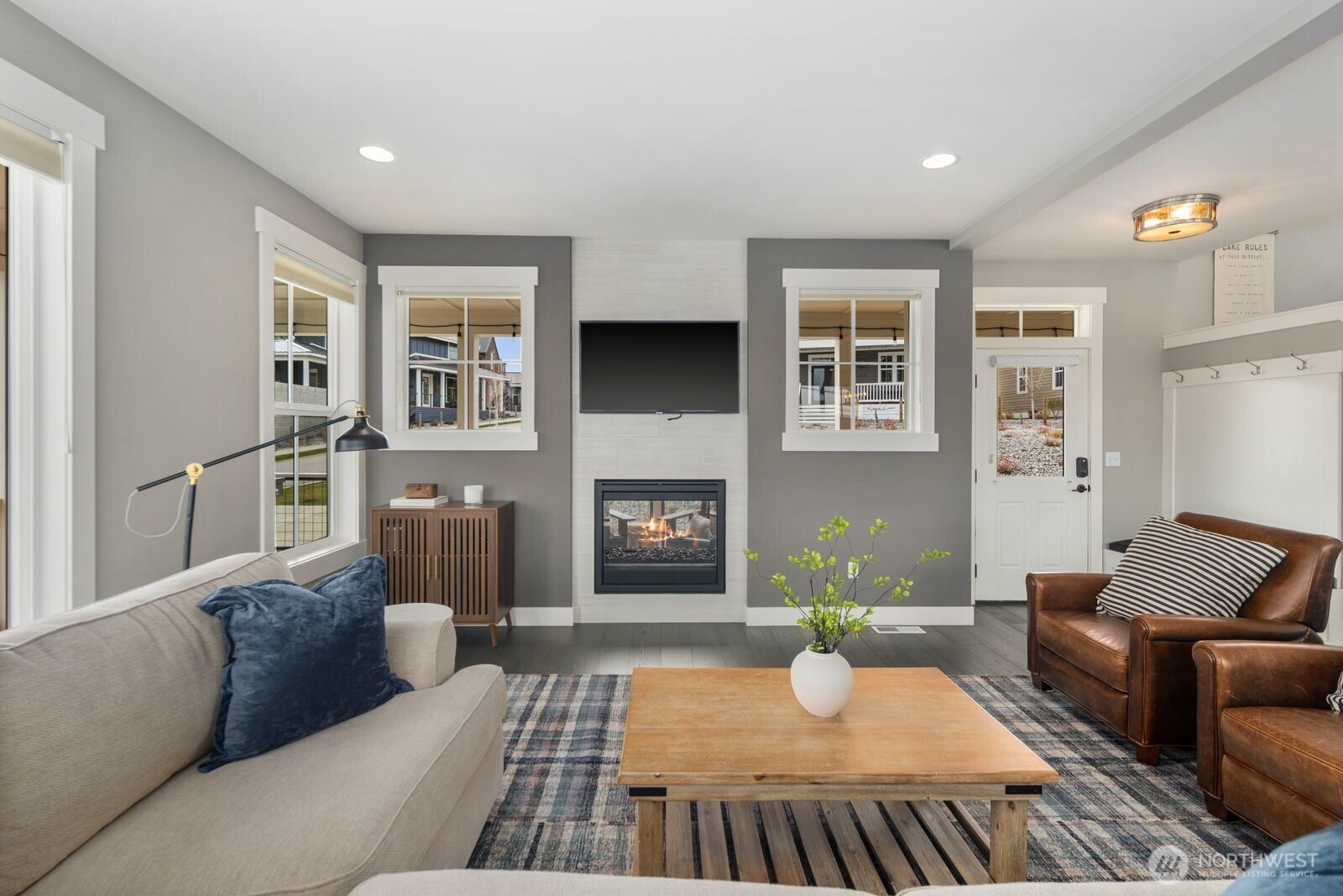 298 Bobcat Lane Chelan, WA 98816 - Photo 12 of 40 a living room with furniture and a fireplace