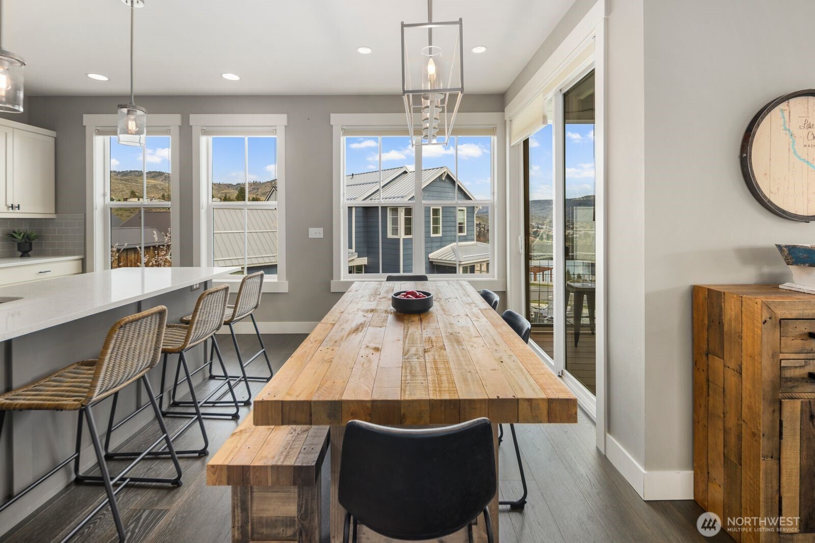 298 Bobcat Lane Chelan, WA 98816 - Photo 13 of 40 a view of a dining room with furniture window and wooden floor