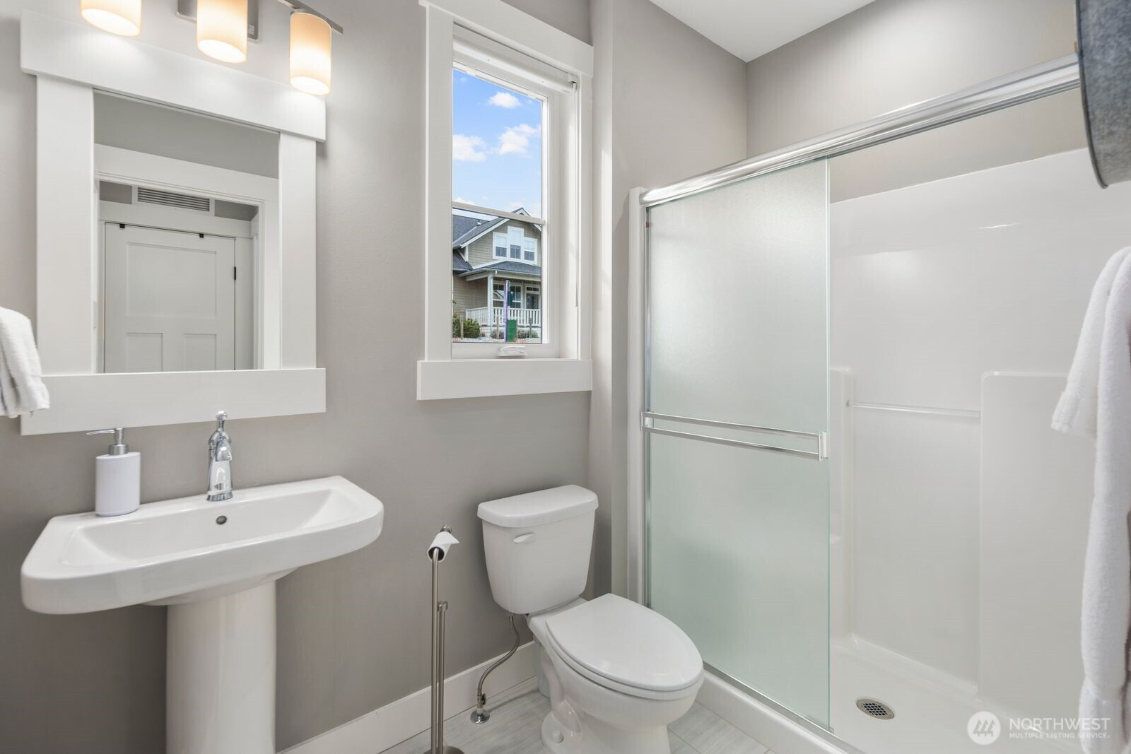 298 Bobcat Lane Chelan, WA 98816 - Photo 21 of 40 a bathroom with a sink toilet and shower