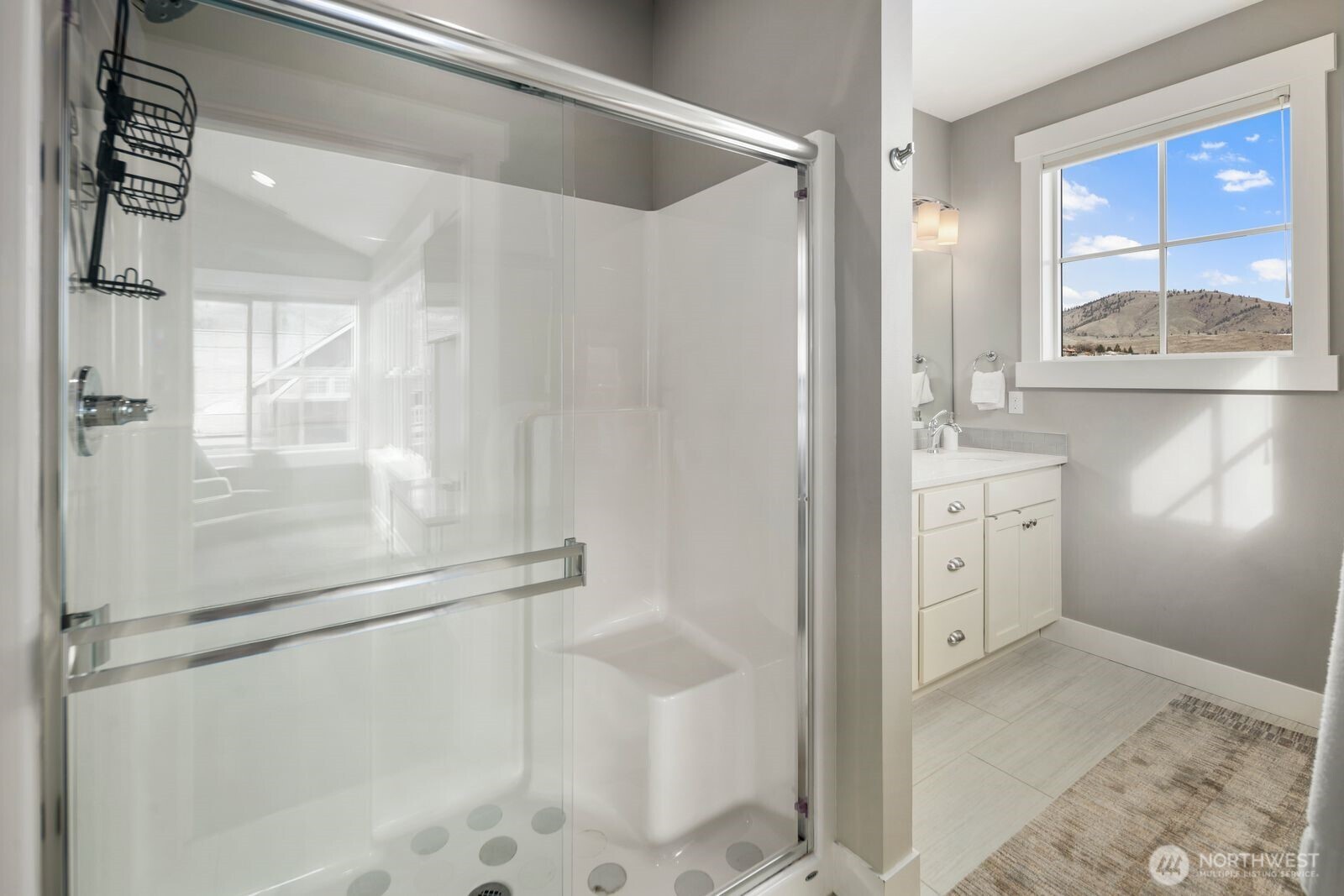 298 Bobcat Lane Chelan, WA 98816 - Photo 30 of 40 a bathroom with a shower and a sink