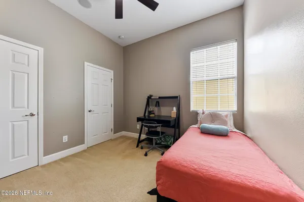 a bathroom with a tub a sink and a shower