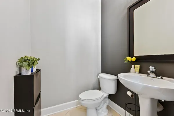 a view of a chairs and table in the patio