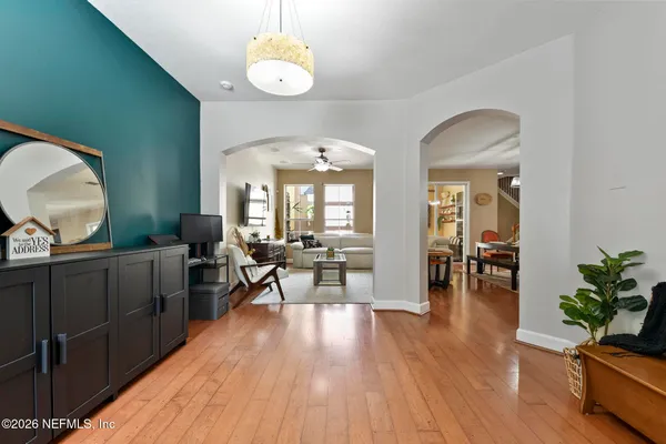 a view of a living room and dining room