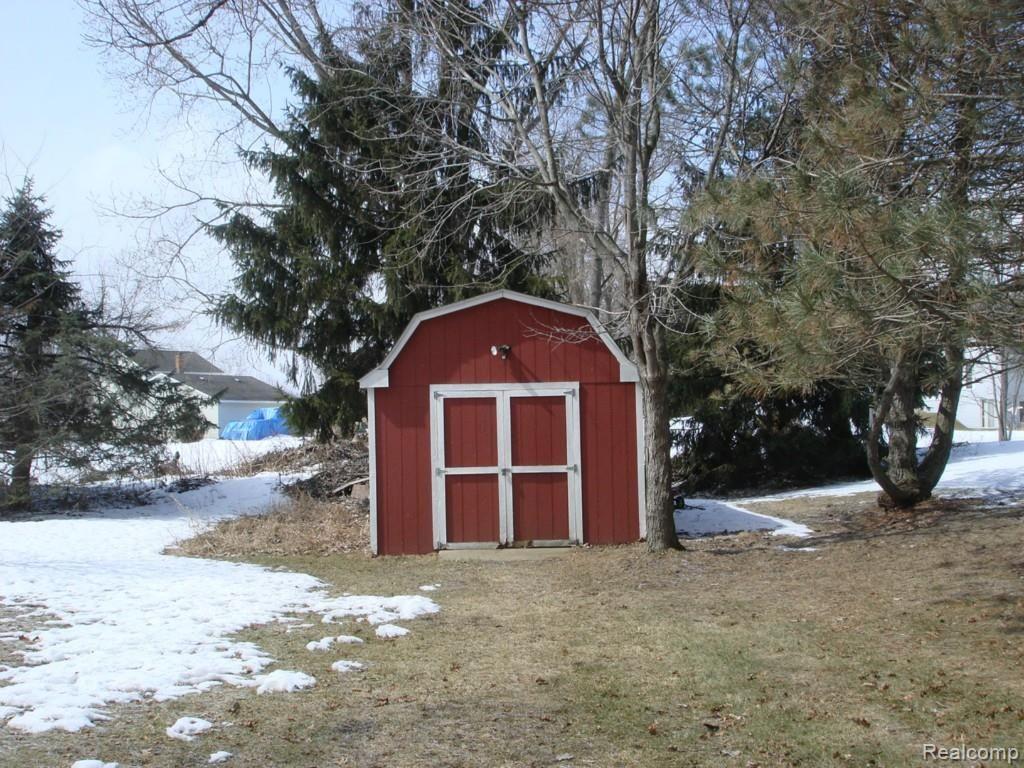 5537 Farley Road Clarkston, MI 48346 - Photo 15 of 16 LG SHED FOR EXTRA STORAGE