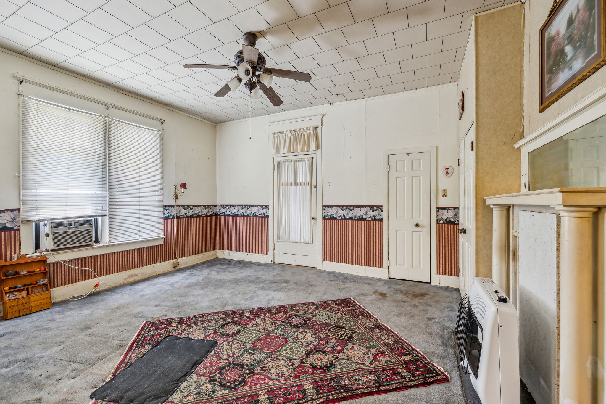 611 1st Avenue Mount Pleasant, TN 38474 - Photo 21 of 33 a view of a livingroom with wooden floor and a ceiling fan
