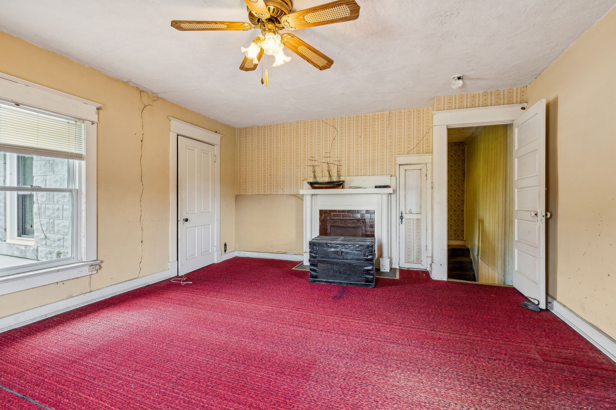 611 1st Avenue Mount Pleasant, TN 38474 - Photo 24 of 33 an empty room with windows and fireplace