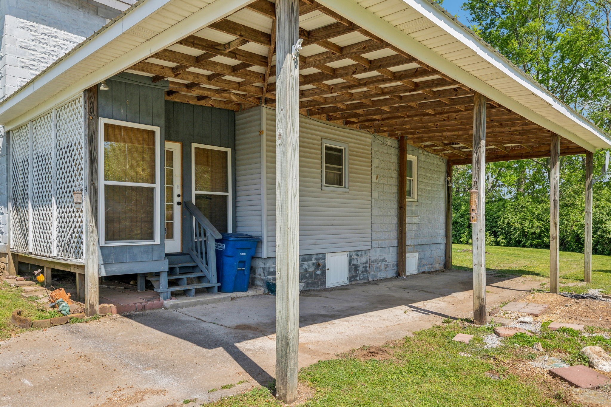 611 1st Avenue Mount Pleasant, TN 38474 - Photo 32 of 33 a view of a house with backyard