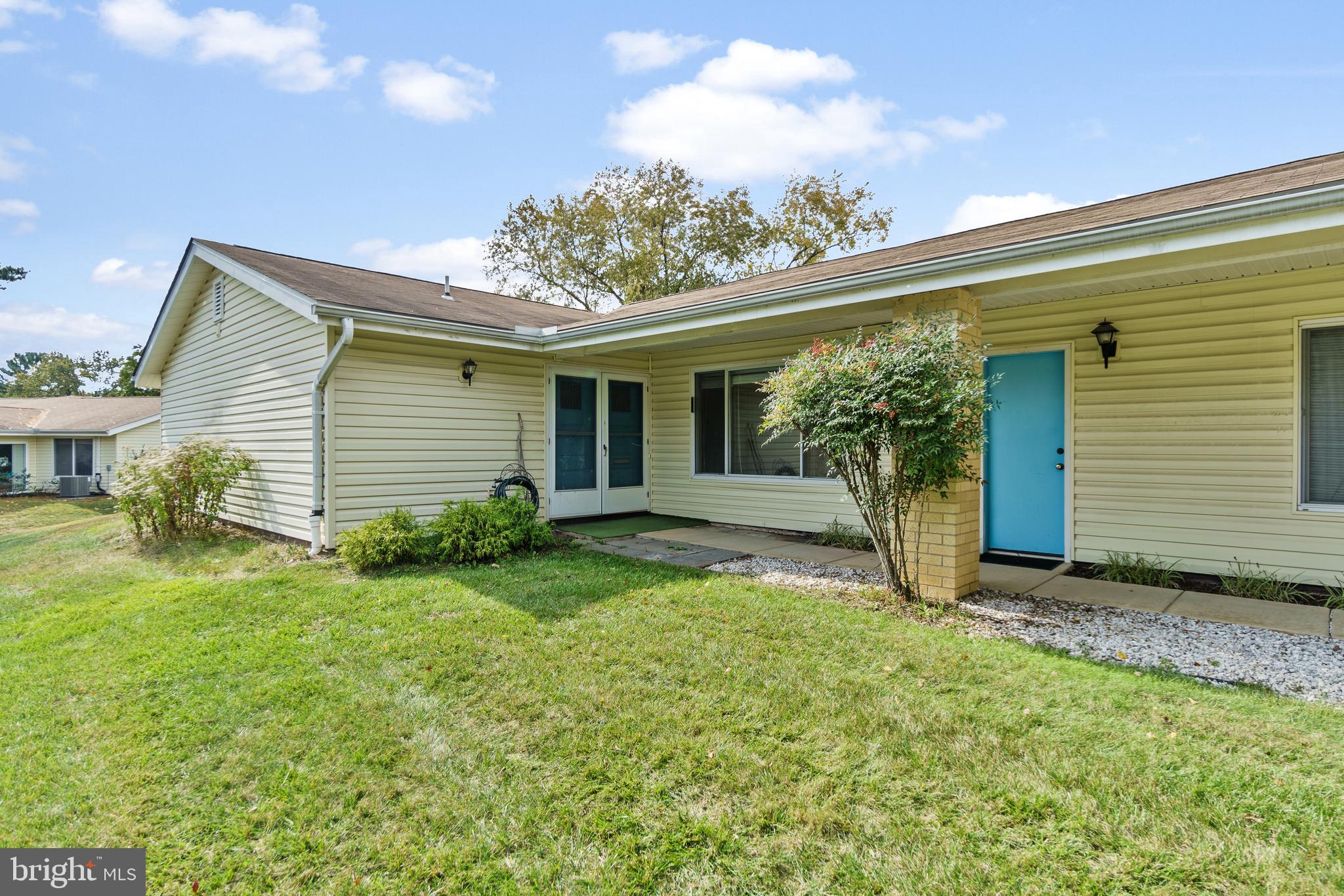 15524 Prince Frederick Way, Unit 118A Silver Spring, MD 20906 - Photo 2 of 31 a view of a house with a backyard