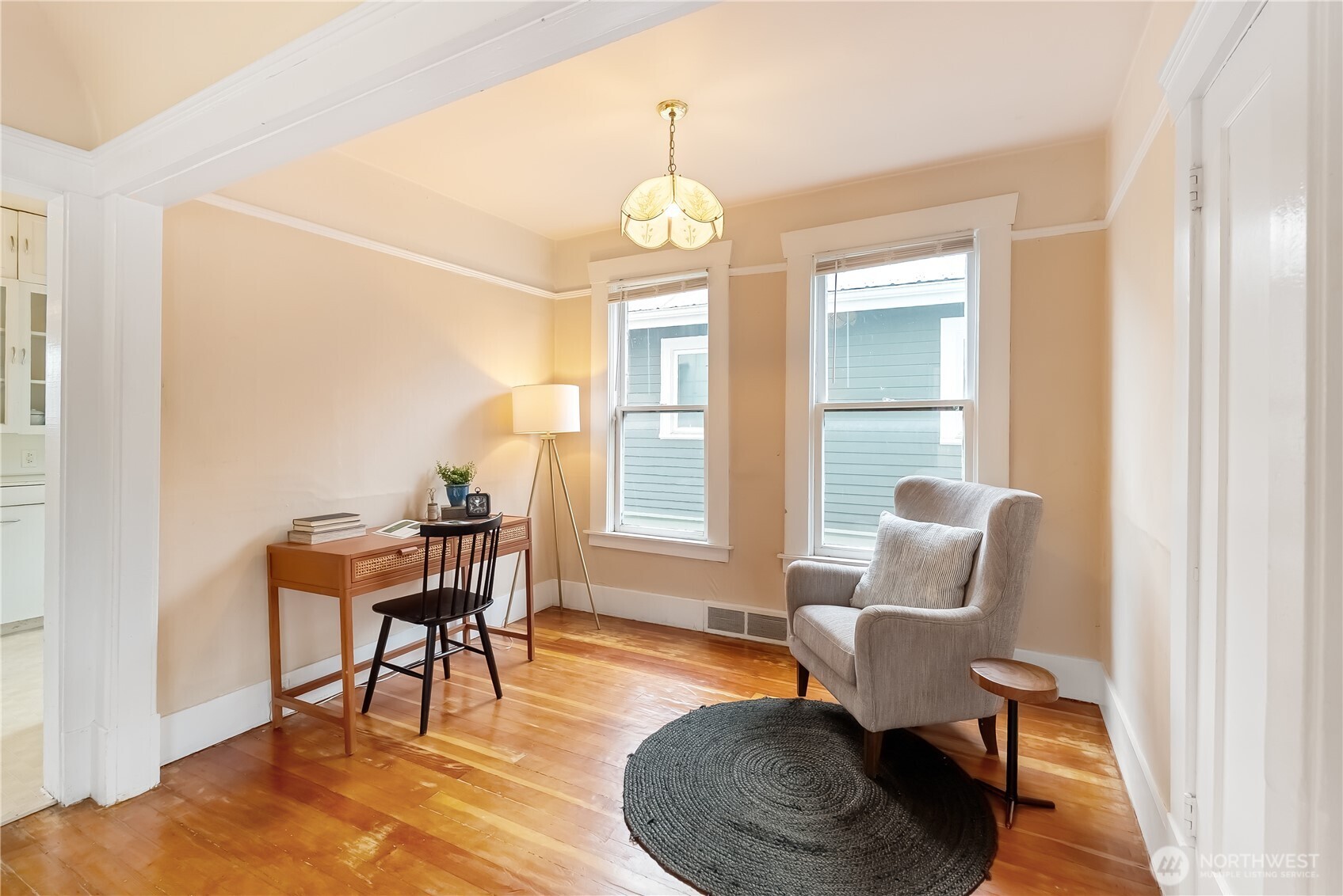 2414 Elm Street Bellingham, WA 98225 - Photo 11 of 36 a dining room with furniture a rug and wooden floor