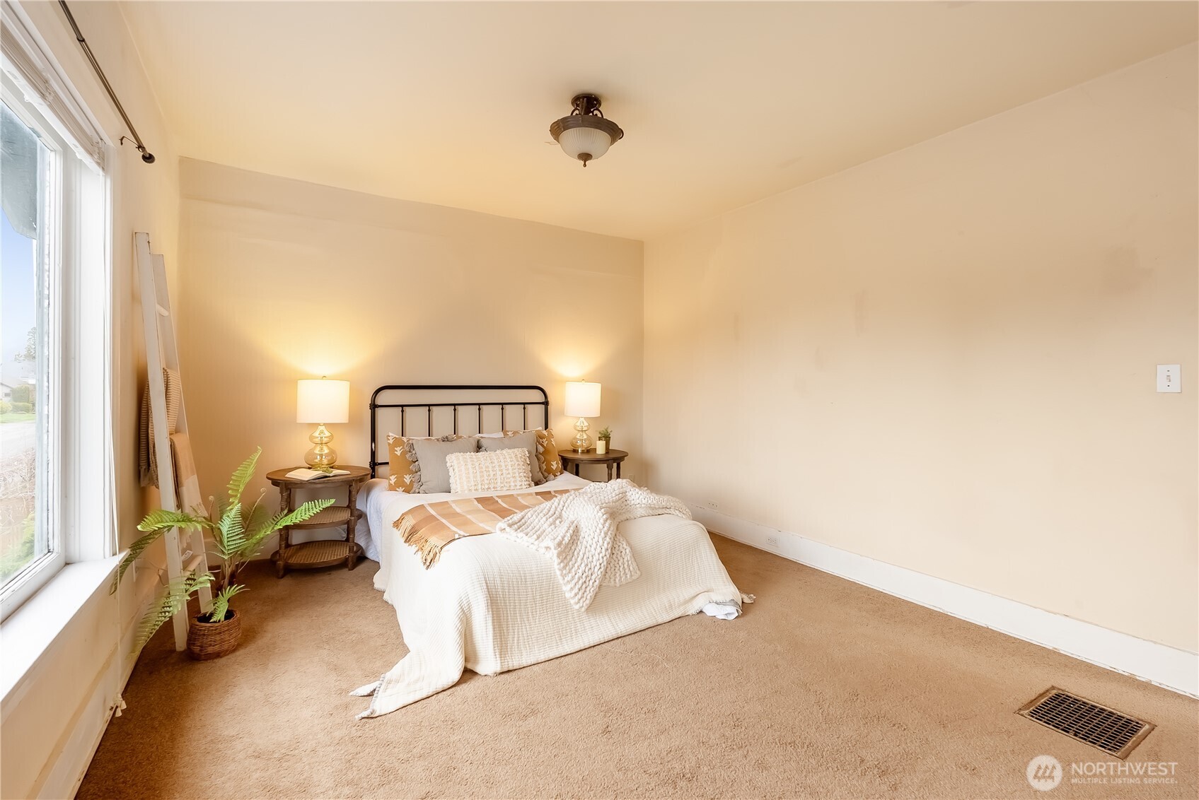 2414 Elm Street Bellingham, WA 98225 - Photo 19 of 36 a bedroom with a bed and a window