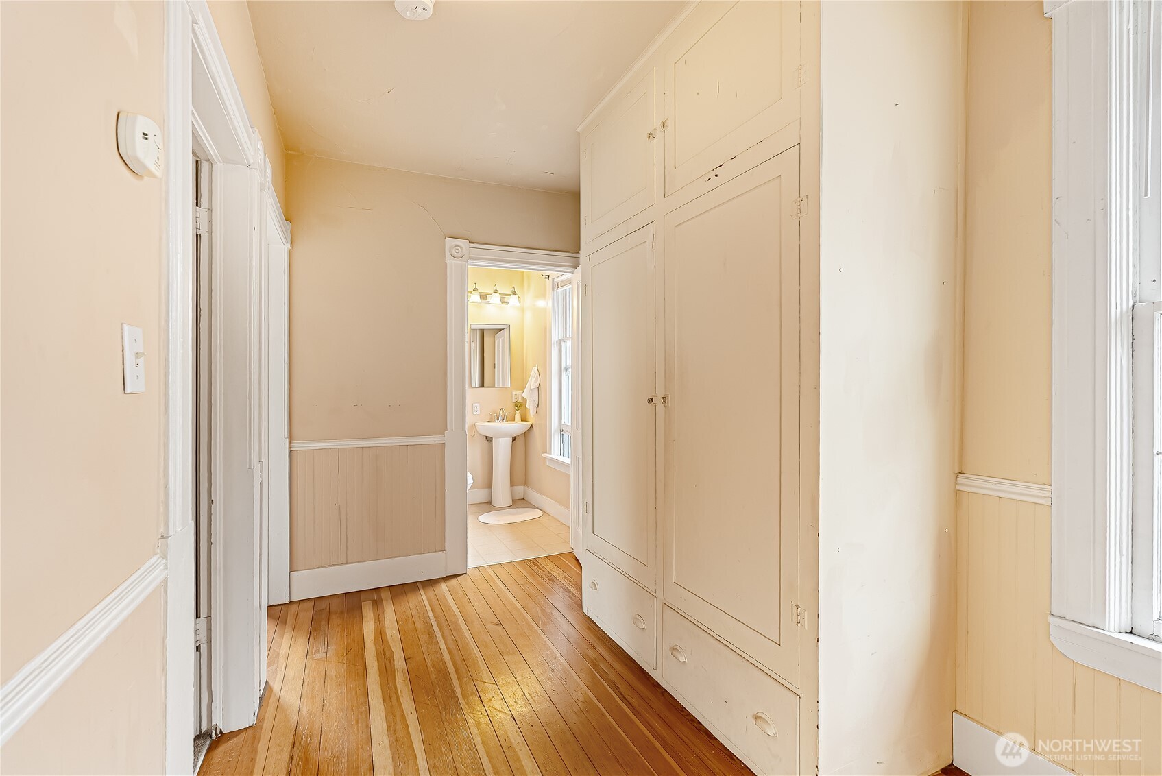 2414 Elm Street Bellingham, WA 98225 - Photo 22 of 36 a view of a hallway with wooden floor