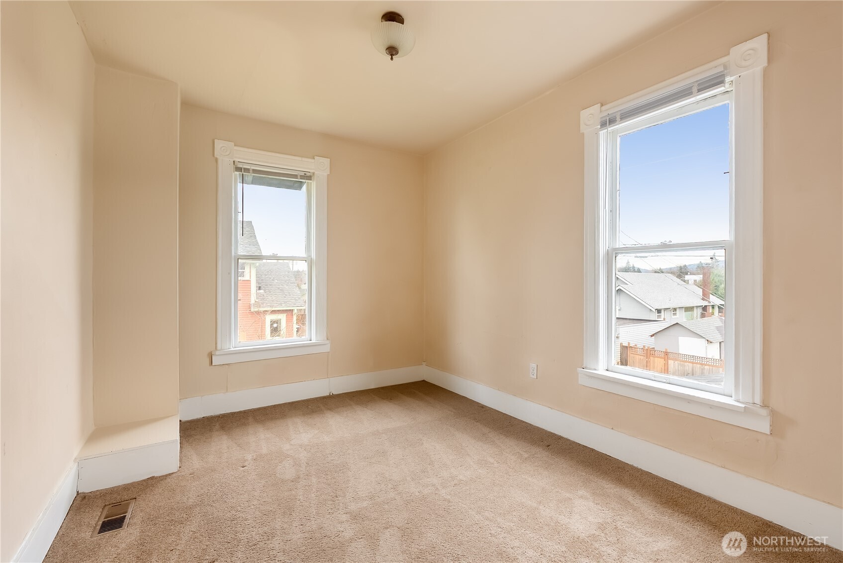 2414 Elm Street Bellingham, WA 98225 - Photo 24 of 36 an empty room with windows