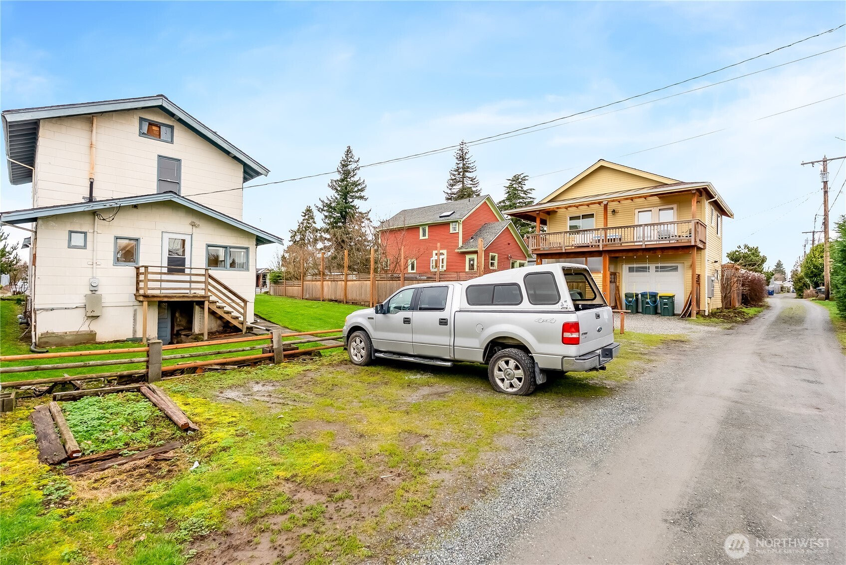 2414 Elm Street Bellingham, WA 98225 - Photo 29 of 36 a view of a street with cars parked in front of it