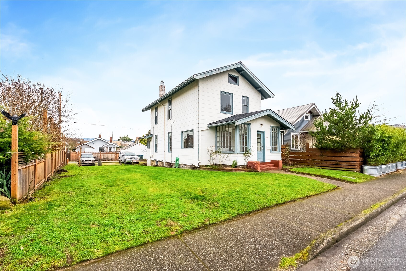 2414 Elm Street Bellingham, WA 98225 - Photo 31 of 36 a view of a house with a yard and sitting area