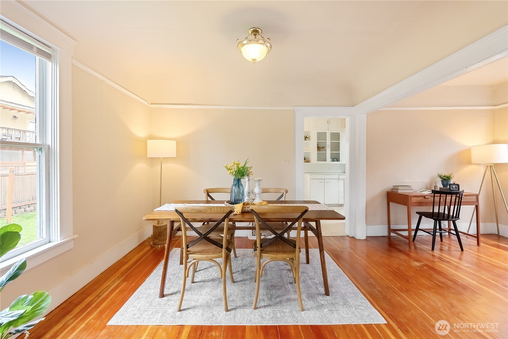 2414 Elm Street Bellingham, WA 98225 - Photo 9 of 36 a view of a dining room with furniture and wooden floor