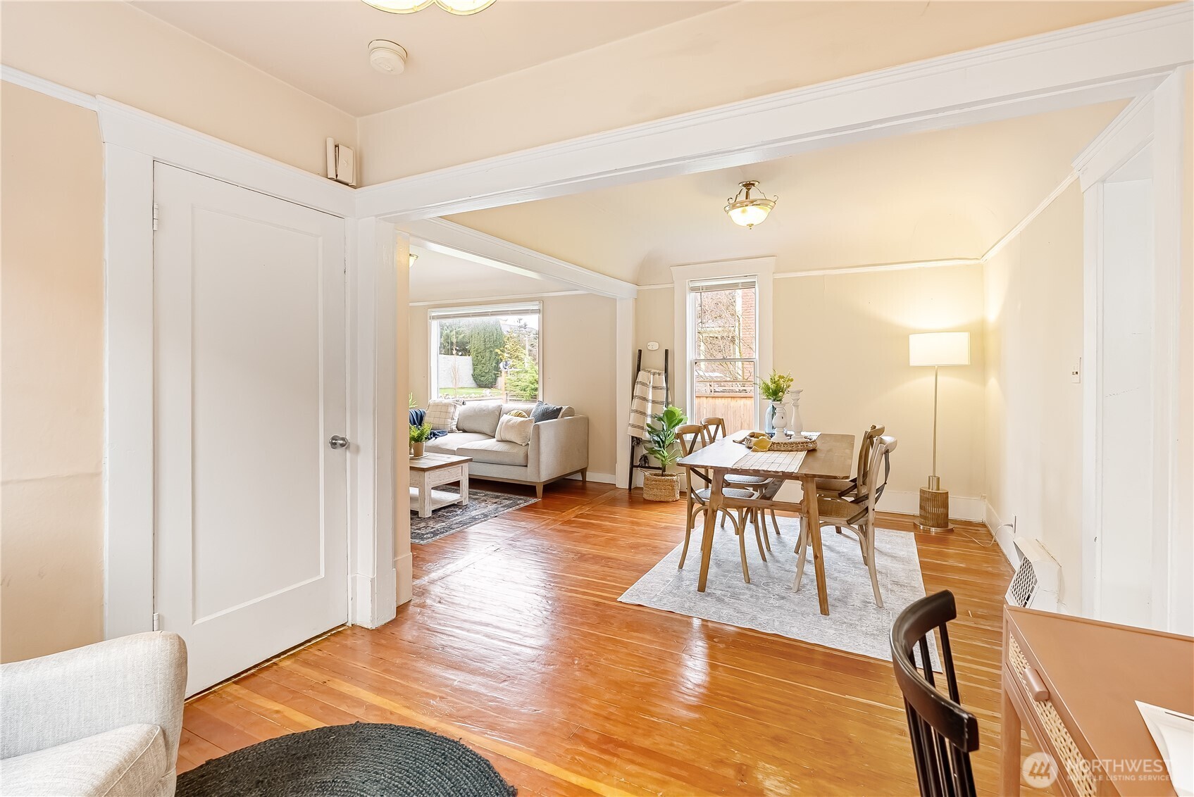 2414 Elm Street Bellingham, WA 98225 - Photo 10 of 36 a living room with furniture a dining table and a large window