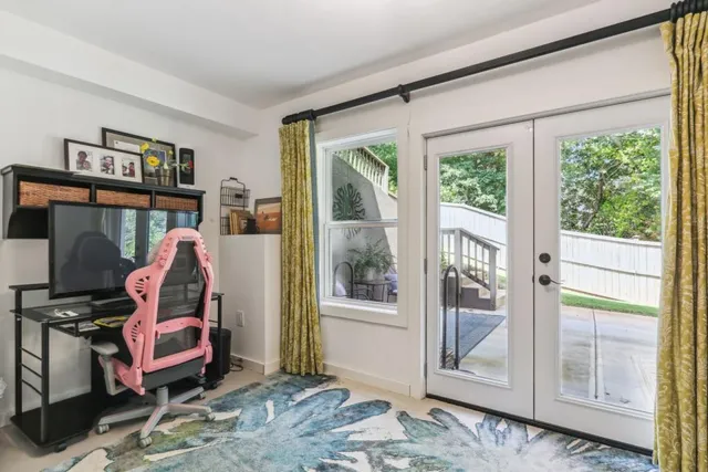 a bed room with a bed and a window