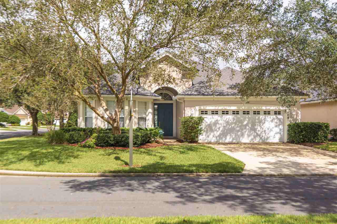 128 St Andrews Pl Drive St. Augustine, FL 32092 - Photo 3 of 38 a view of a house with a yard