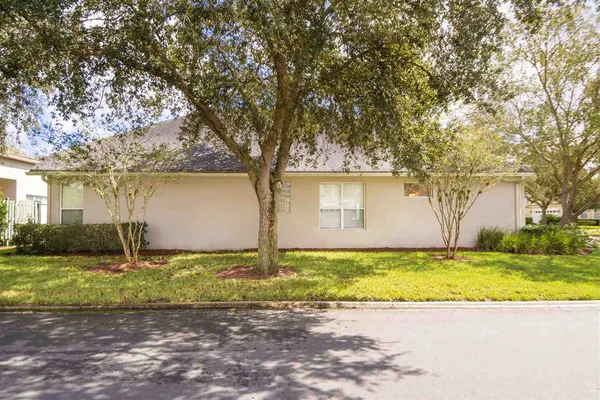 a view of a swimming pool with a yard