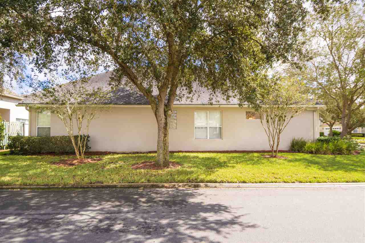 128 St Andrews Pl Drive St. Augustine, FL 32092 - Photo 7 of 38 a view of a swimming pool with a yard
