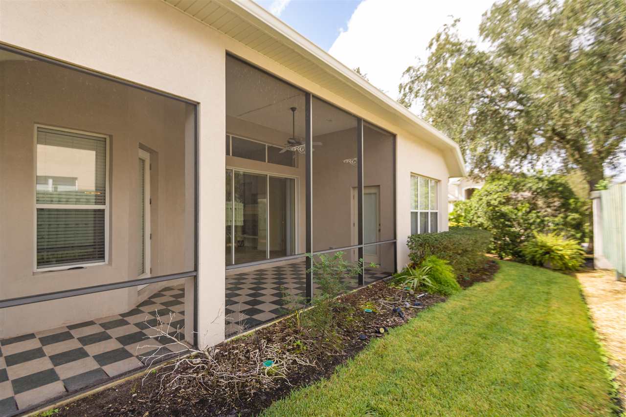 128 St Andrews Pl Drive St. Augustine, FL 32092 - Photo 9 of 38 a view of a house with backyard and garden