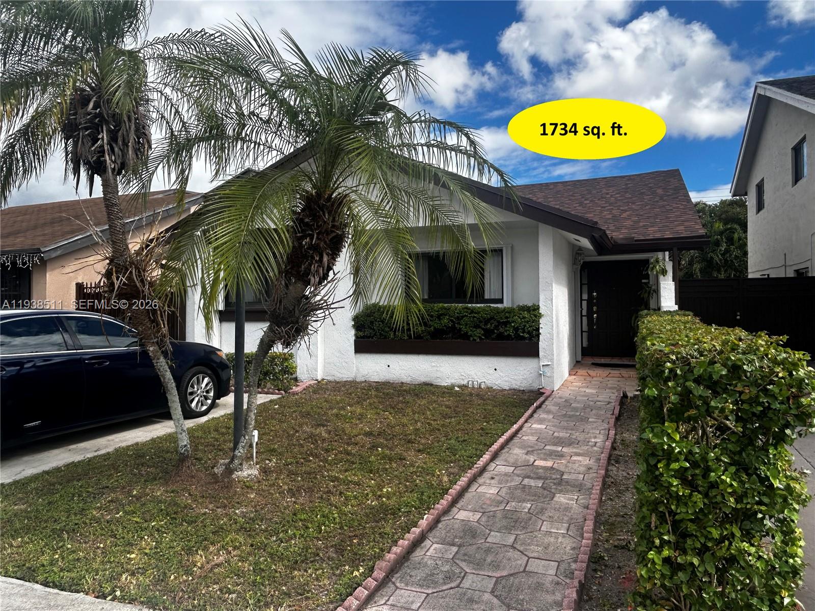 a view of a house with a swimming pool
