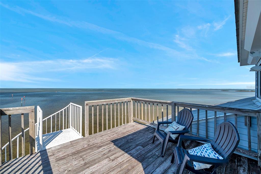 2417 Sunset Vista Drive Spring Hill, FL 34607 - Photo 17 of 61 a view of a chair and table on the wooden floor