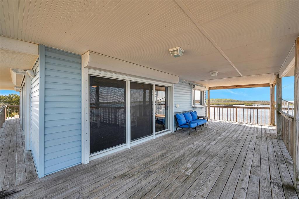 2417 Sunset Vista Drive Spring Hill, FL 34607 - Photo 24 of 61 a view of a livingroom with wooden floor and furniture