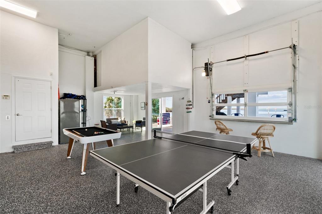 2417 Sunset Vista Drive Spring Hill, FL 34607 - Photo 28 of 61 a room with pool table and windows