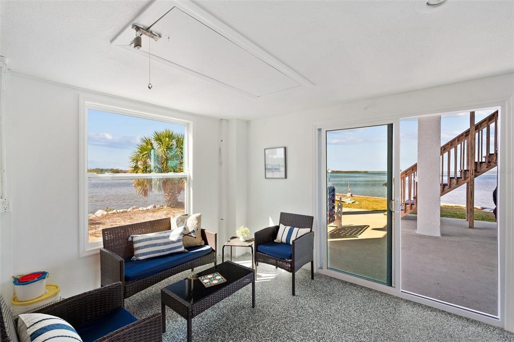 2417 Sunset Vista Drive Spring Hill, FL 34607 - Photo 29 of 61 a living room with furniture and a window