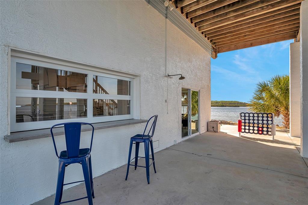 2417 Sunset Vista Drive Spring Hill, FL 34607 - Photo 33 of 61 a view of a chairs and table in the balcony