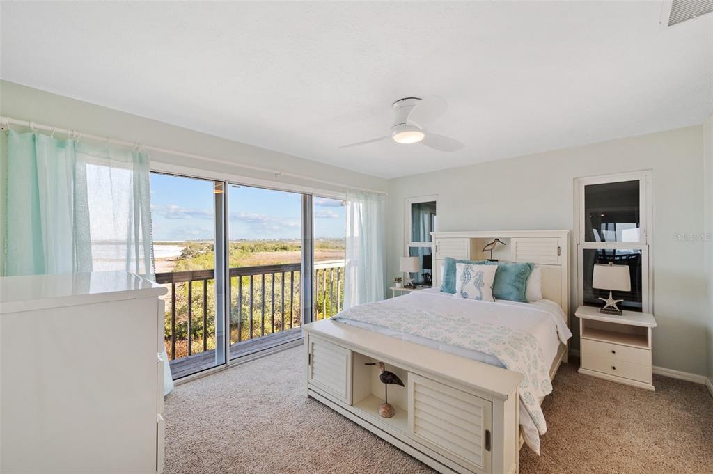 2417 Sunset Vista Drive Spring Hill, FL 34607 - Photo 39 of 61 a view of a bedroom with furniture and windows